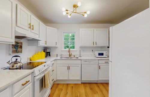 Beach Institute Hotel | Stylish southern stay with two full homes in one, quaint backyard, and walkable