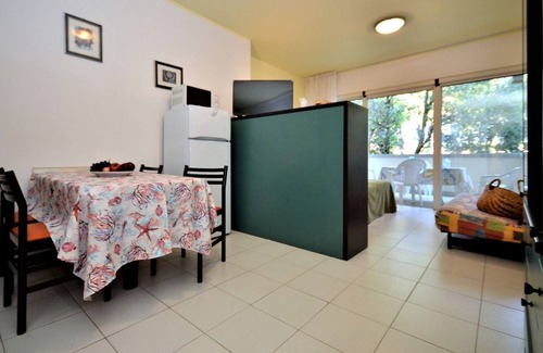 Bibione Pineda Apartment | Stylish studio flat in a building surrounded by a green landscape