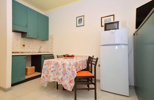 Bibione Pineda Apartment | Stylish studio flat in a building surrounded by a green landscape