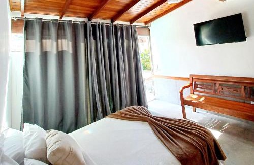 Portal das Artes House | Suítes Estou de Férias Paraty