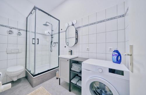Sudenburg Apartment | SudenburgNest - Studio-Apartment mit iPad, Boxspringbett, Netflix & Waschmaschine