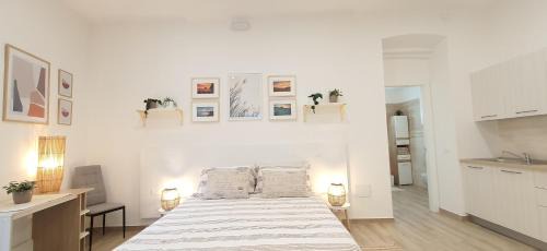 Guspini Apartment | SUITE BLANC APARTMENTS - Monolocali indipendenti con cucina e bagno privato - Check-in e check-out con codice in autonomia h24 - Terrazza in comune NECESSARIO AVERE WATHSAPP O APP DI MESSAGGISTICA ISTANTANEA PER FOTO E VIDEO