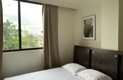 Cali House | Suite con terraza privada