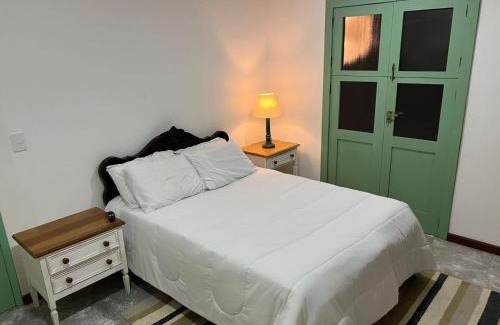 Areal House | Suite IPÊ ROSA