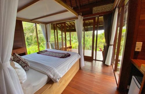 Peliatan Cabin | Suite Room with AC ,surrounded by ricefield By iLys Collection