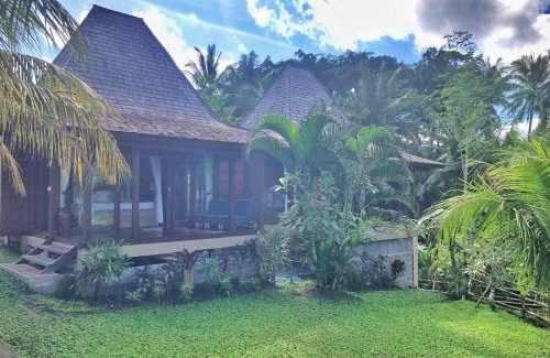 Peliatan Cabin | Suite Room with AC ,surrounded by ricefield By iLys Collection