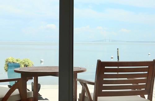 Pinellas Point House | Sun-Kissed Serenity: Private Beach and Onsite Pool, Balcony, Pets Allowed