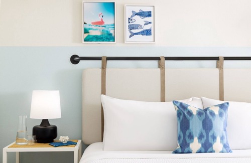 New Town Hotel | Sun, Sip, & Socialize | Island Stay w/2 Pools & Backyard Bash