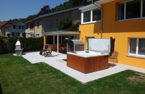 Kulm Apartment | Sun terrace with Jacuzzi & shower experience with views of woods & meadows