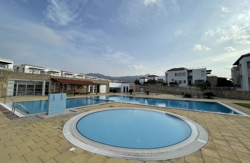 Tatlisu Apartment | Sunny Cypriot Apartment W/Site Pool, Gym and Kids playing area!