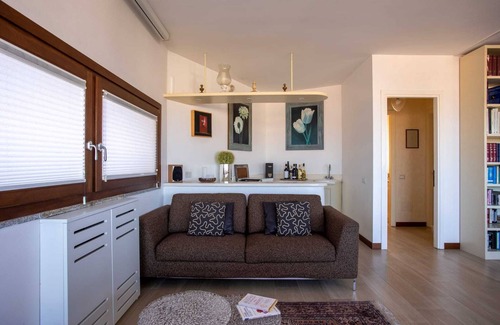 Olbia Apartment | Sunny rooftop loft with gorgeous views of Olbia