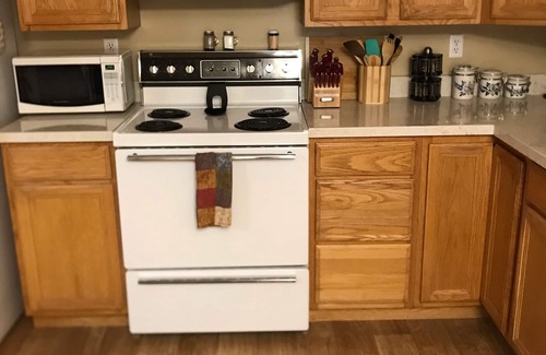 Sandy Apartment | Sunny Walk-Out Basement Apartment with office workspace