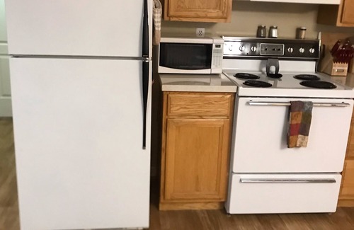 Sandy Apartment | Sunny Walk-Out Basement Apartment with office workspace