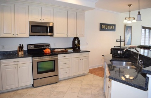 Chincoteague Condo | Sunset Bay Villa 315-WATERFRONT! Pool and Fishing Dock