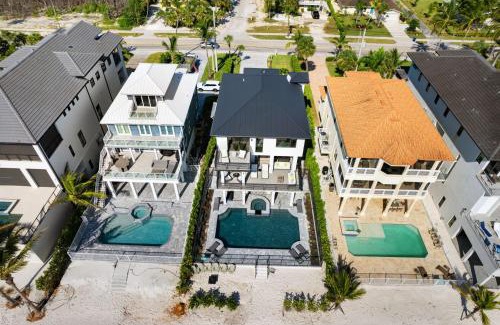 Bonita Springs House | Sunset Beach, Modern, Luxury Beachfront Pool Home, Sleeps 12