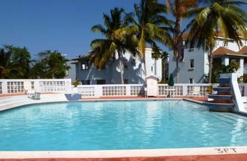 Orange Bay Condo | Sunset Villa Negril, Jamaica Beautiful beach front 3 BR vacation property.