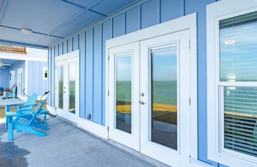 Rockport Condo | Sweeping views of Copano Bay from this newly constructed ground floor condo with a pool and a new fishing pier!