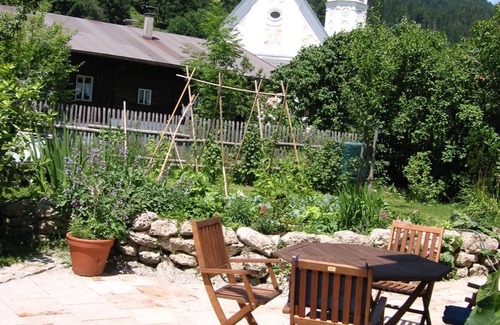 Aschau im Chiemgau House | Swiss stone pine vacation home with sauna, large terrace and fenced garden