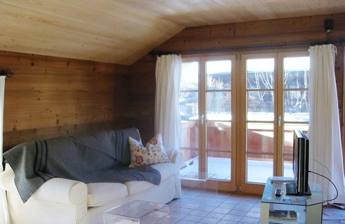 Aschau im Chiemgau House | Swiss stone pine vacation home with sauna, large terrace and fenced garden