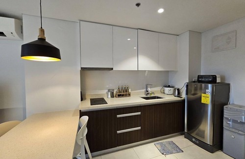Maribago Apartment | Tambuli Tower C Unit 5D