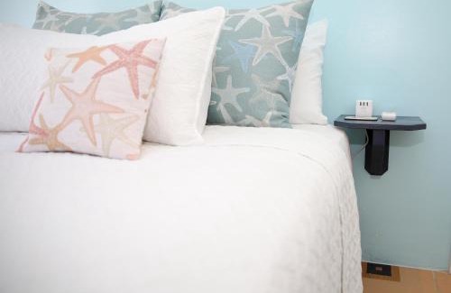 Nassau Apartment | Tangerine Sunsets Castaway by the sea