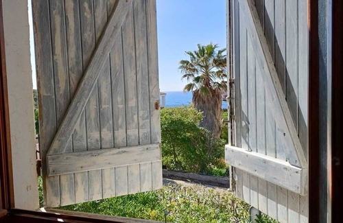 Castelsardo House | Teresa house with garden overlooking the cliff and 5 minutes from the beach