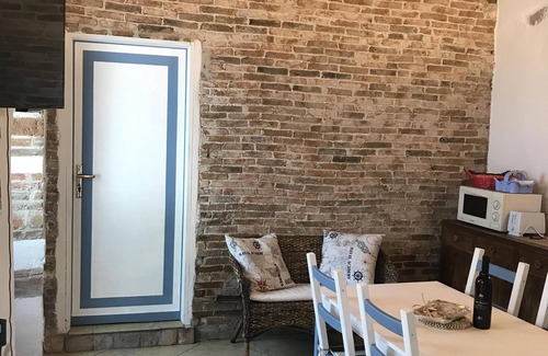 Onifai Apartment | "Terra" two-room apartment, in the Gulf of Orosei, in a typical Sardinian house with garden