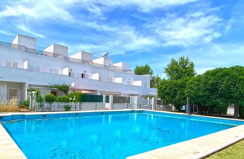 Conil de la Frontera Cottage | Terraced house with shared pool in residential area in Conil, sleeps 5