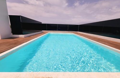 RACINE EXTENSION Apartment | The 28 Triangle d'Or by IB Signature - Stylish two-Bedroom flat - Wifi, Self Check-in, Day and Night Security, Terrace, Swimming pool, free parking close to all facilities