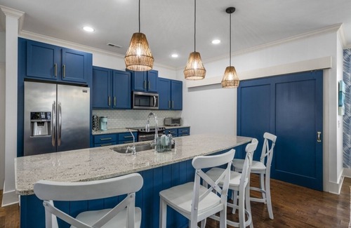 Wilmington Beach House | The Blue House at Carolina Beach, swim spa, ping pong, bikes & pet friendly!