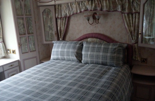 Boat of Garten Ski Chalet | The Boat House Self Catering Chalet, Boat of Garten, Near Aviemore, Sleeps 6