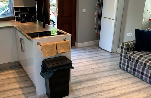 Winterbourne Cabin | The Cabana ideal home to play & stay. Private Hot Tun and garden
