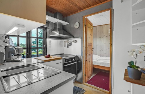 Rindby Strand House | The charming and well-maintained house is situated on a charming dune plot.
