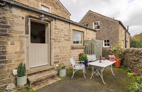 Holmfirth Cottage | THE COW SHED, with open fire in Holme, Yorkshire