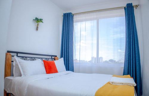 Riruta Apartment | The Cozy Nest with Pool, Gym and Netflix