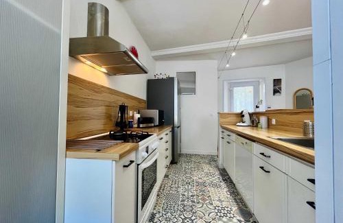 Grandcamp-Maisy Apartment | The Duplex des Flots In the heart of Grandcamp just steps from the beach