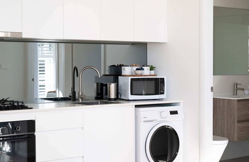 Orange Apartment | The Elm Apartments - The Cowhide Room