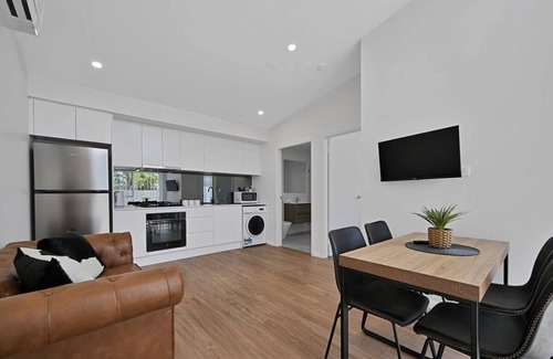 Orange Apartment | The Elm Apartments - The Cowhide Room