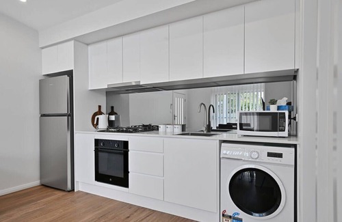 Orange Apartment | The Elm Apartments - The Cowhide Room