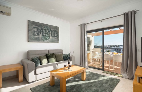 Porto de Mos Apartment | The Emerald - Lagos Apartment by Ideal Homes