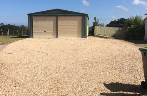 Lakes Entrance House | The Farmhouse Country Charm large yard Ample Parking Garage Available to use.