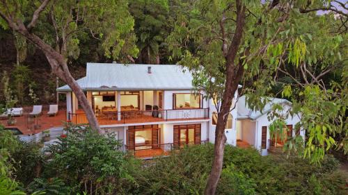 Clifton Beach House | The Ferns Villa Serene Rainforest Retreat with Ocean Breezes