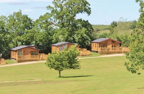 Dawlish House | The Firs Plus are an upgrade from the Firs mini lodge and has 3 bedrooms.