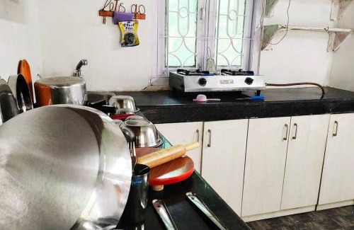 Sualkuchi House | The Golden Nest Cottage - Two Bedrooms with King size Beds and a private open kitchen - Non-AC, kitchen uses 200 per night