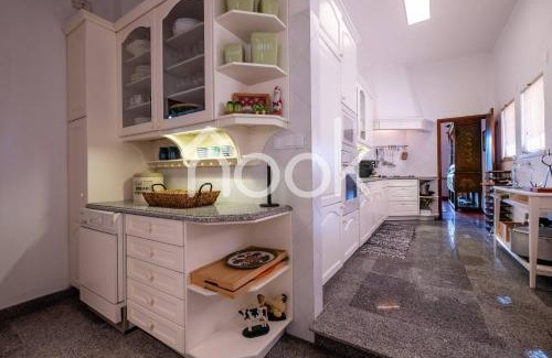 Aguas Belas Villa | The Lake House by NOOK