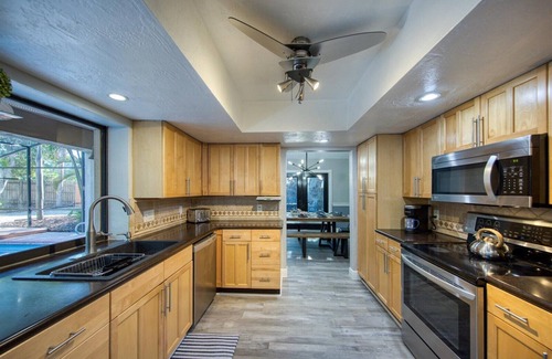 Seminole Villa | The Mermaid House. 5/4 home 1 mi to beach w heated(free) saltwater pool w/lanai