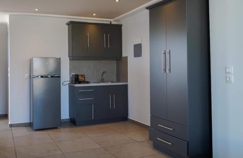 Fira Hotel | The Noverian Bios Caldera Sunset Suites