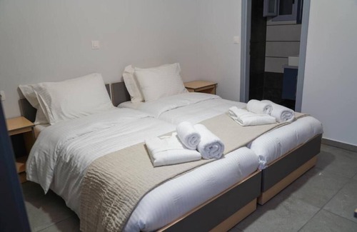 Fira Hotel | The Noverian Bios Caldera Sunset Suites