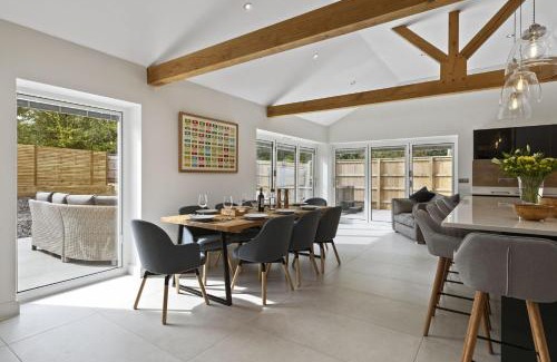 Porthyrhyd House | The Old School House - A Superb Newly Converted Barn with Hot Tub Sleeping 8 guests
