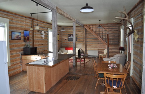Pray Cabin | The Original Logs On The Inside Walls Make This A Cozy Montana Getaway.